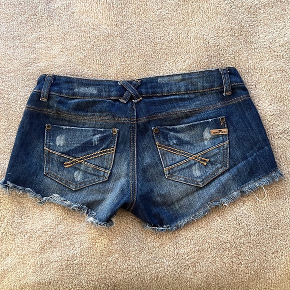 Almost Famous dark blue denim low rise shorts with some distressing. SZ 5 - Picture 2 of 3